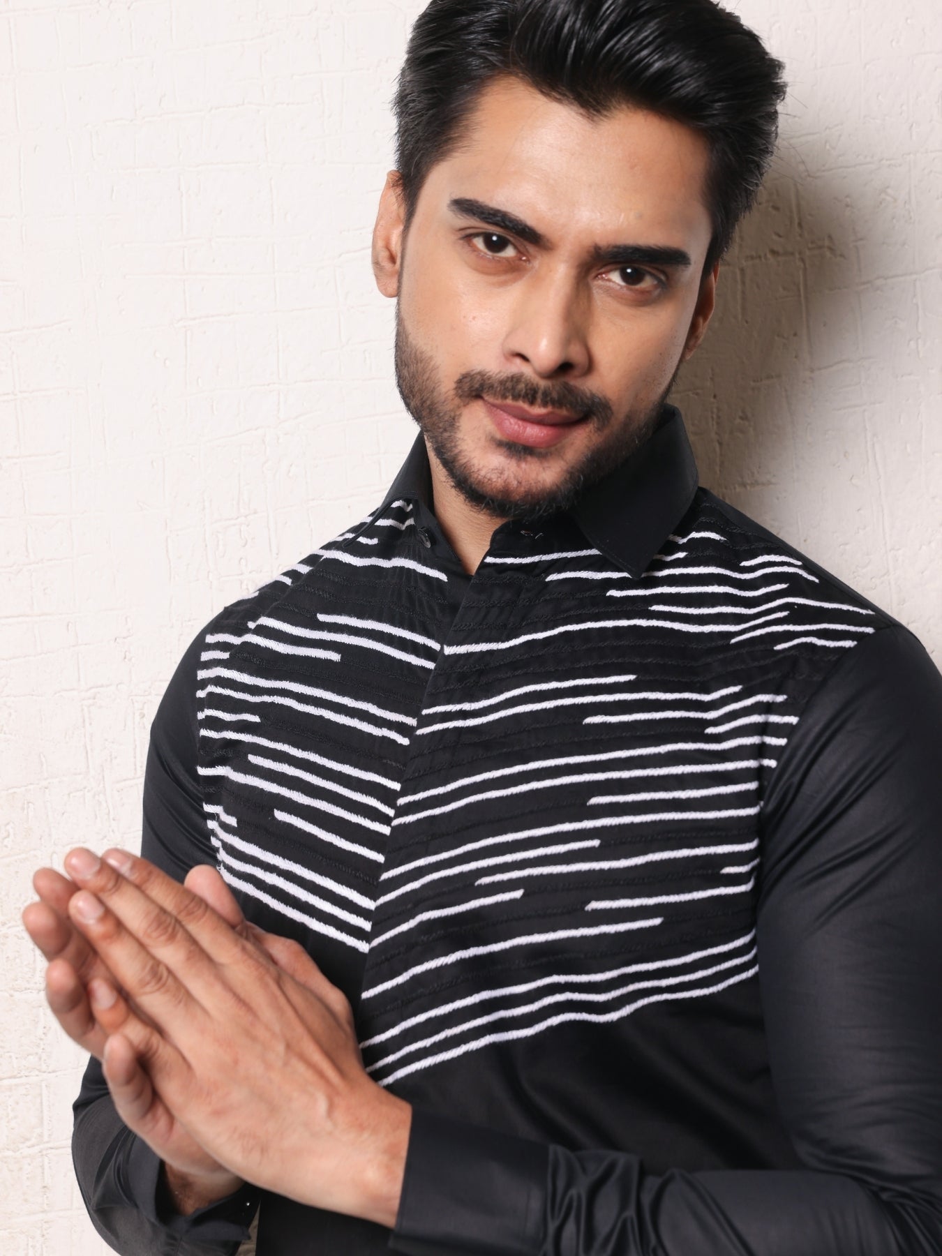 Embroidered black cotton shirt with thread